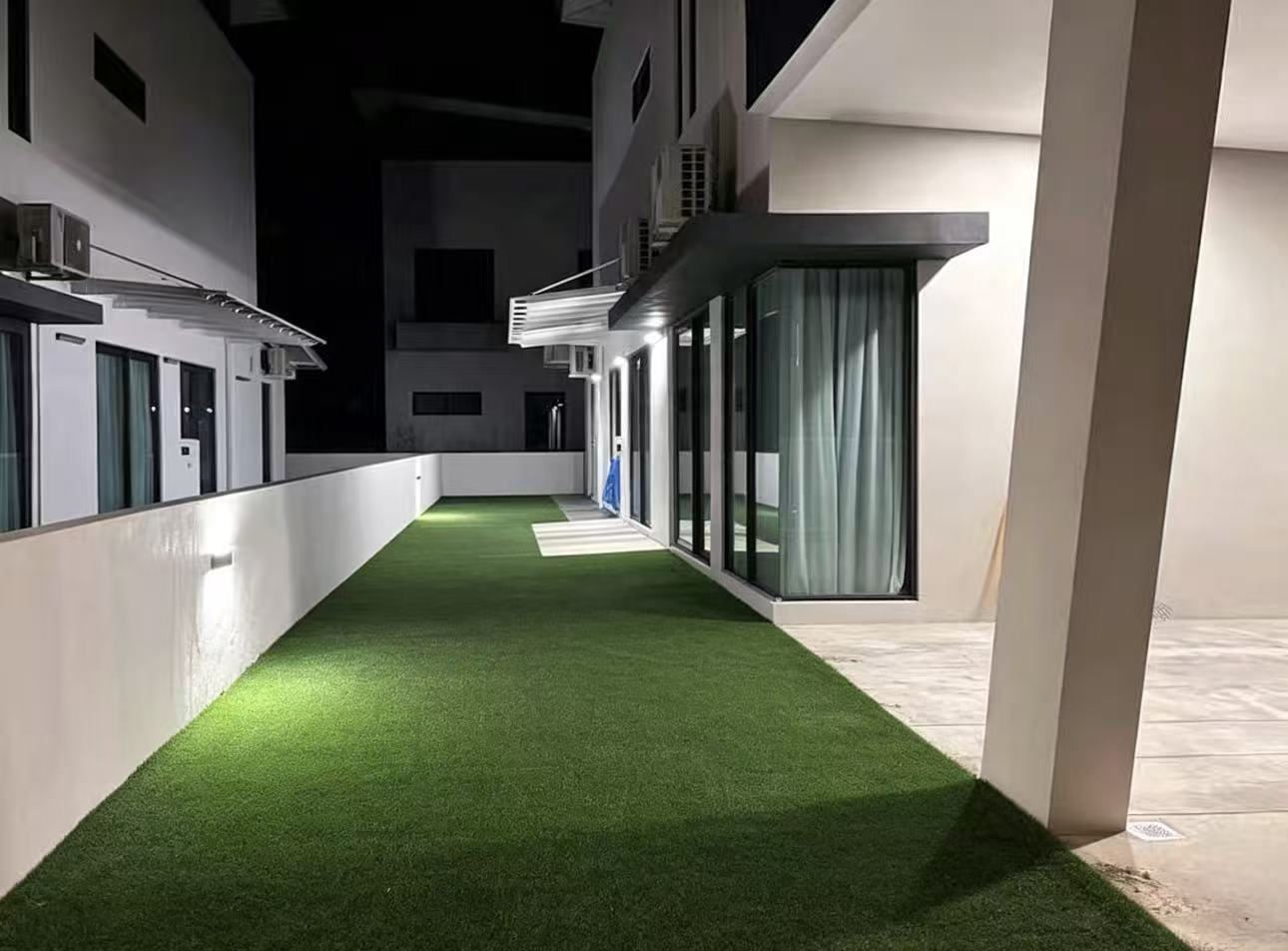 Grass courtyard between villa units
